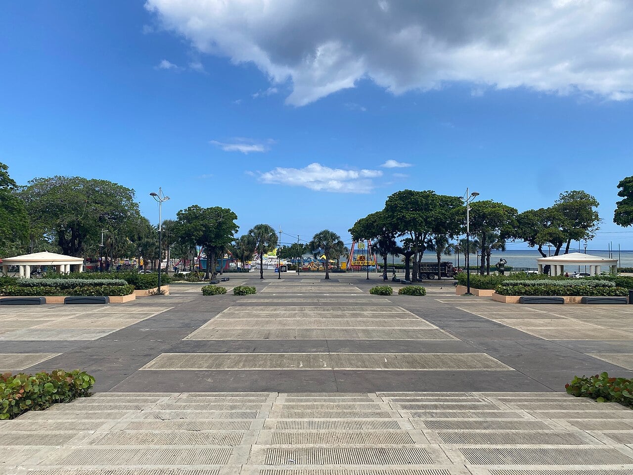 Wide stone plaza in Parque Eugenio María de Hostos in Santo Domingo, looking toward the Caribbean Sea.