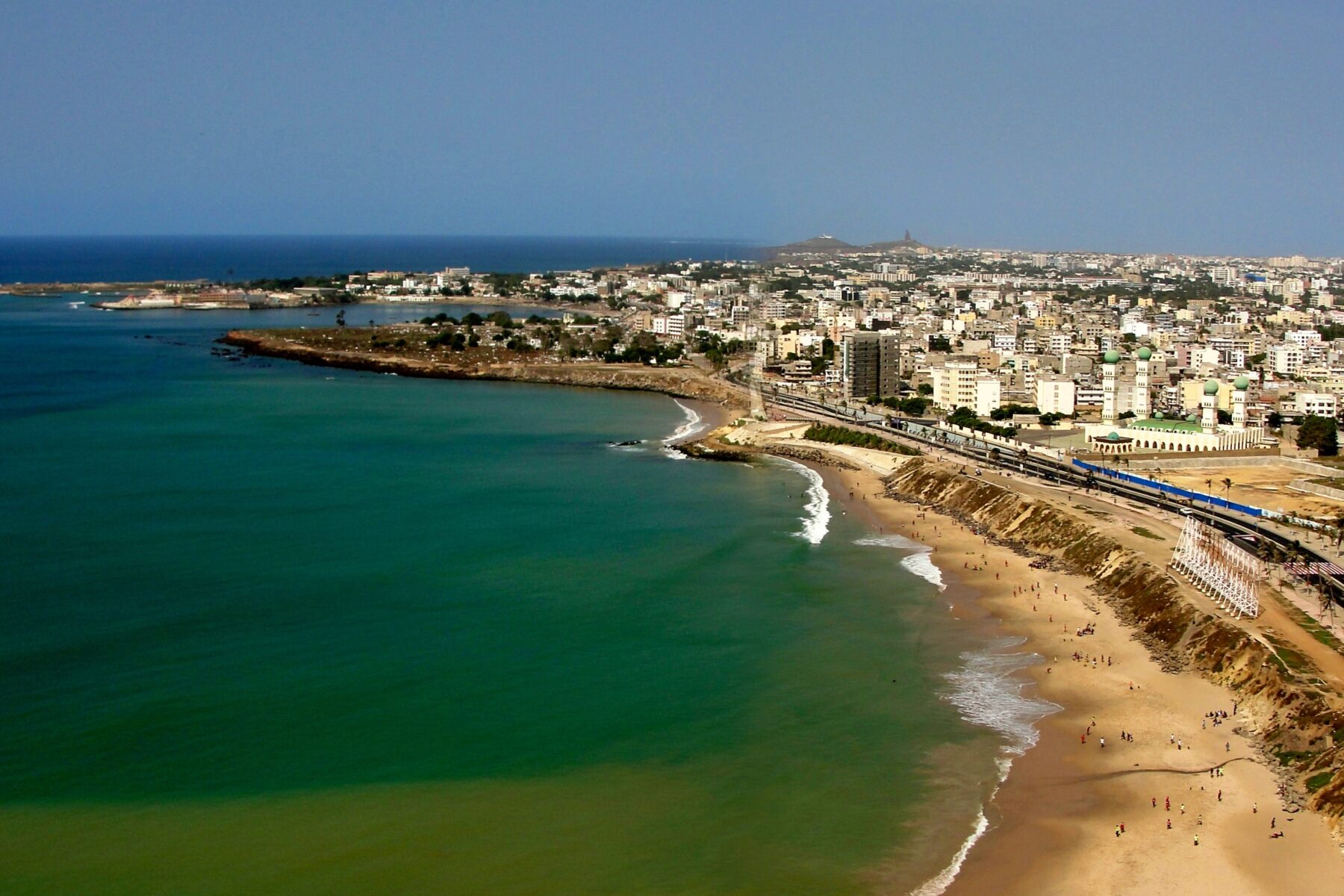 Aerial view of the Dakar coastline, beach and city buildings in Senegal