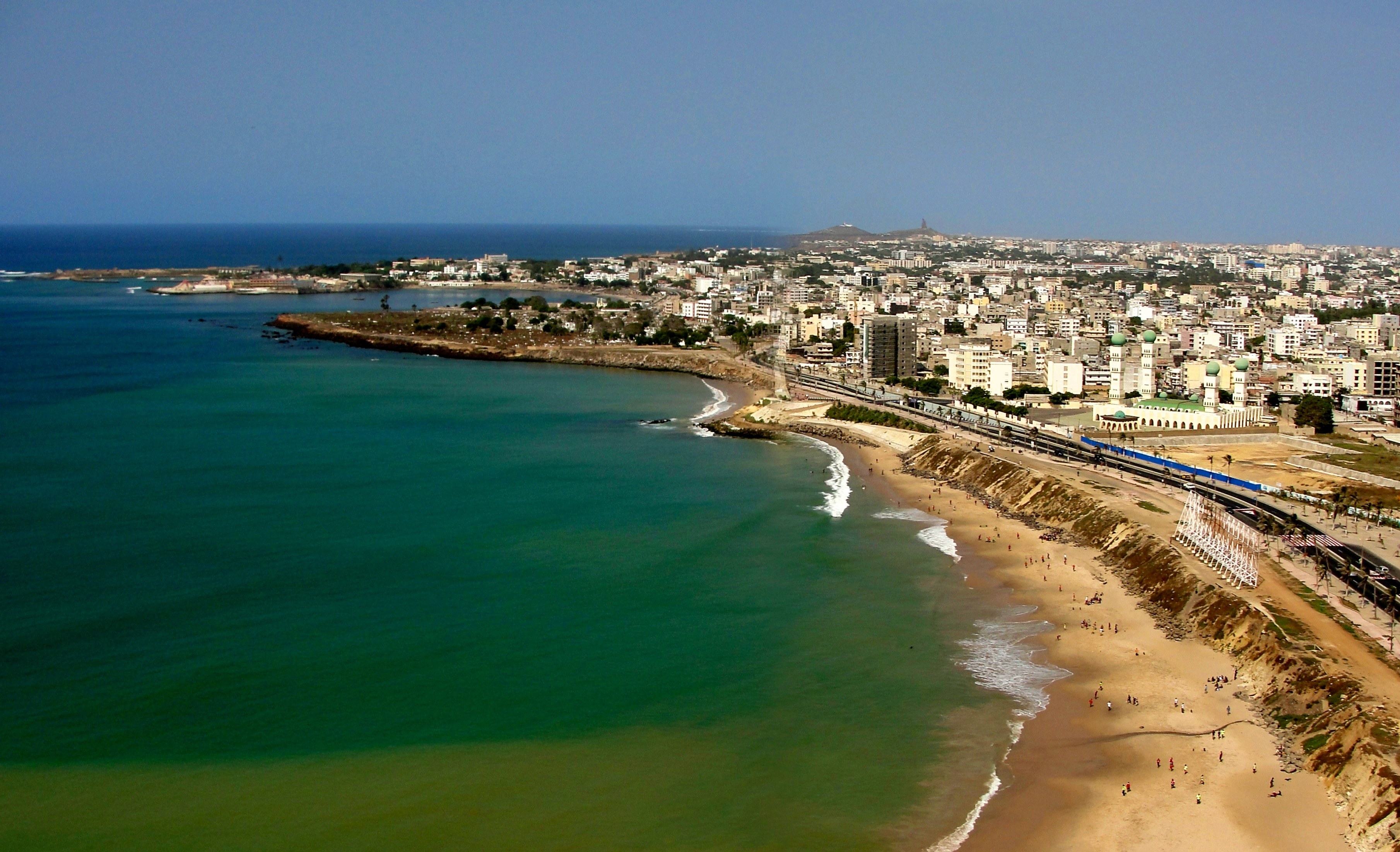 Aerial view of the Dakar coastline, beach and city buildings in Senegal