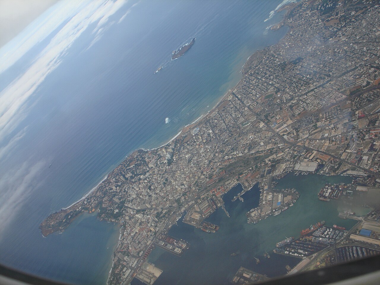 Aerial view of Dakar on the Atlantic coast with its harbour, docks and cargo ships