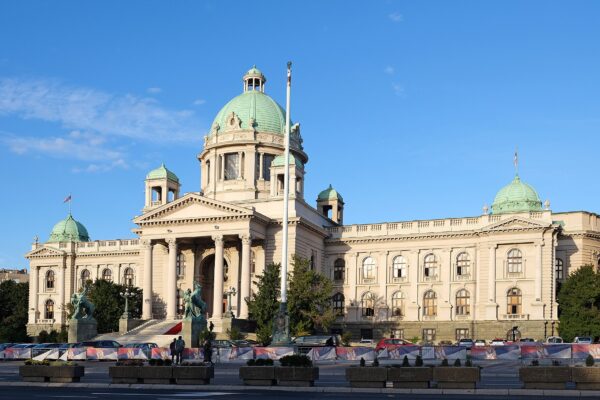 The domed House of the National Assembly of Serbia in Belgrade under a blue sky