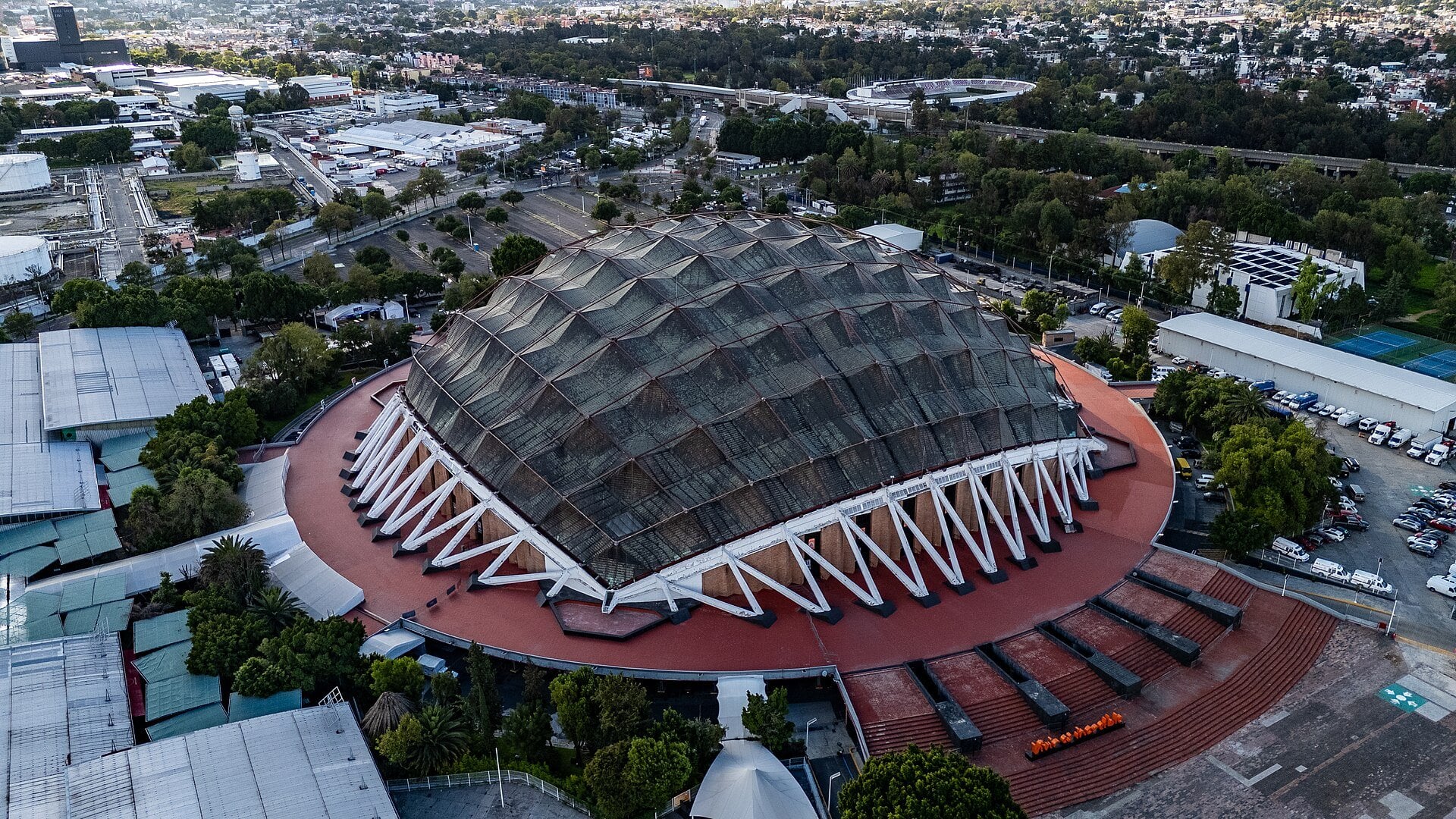 Aerial view of the domed Palacio de los Deportes arena in Mexico City, where Soda Stereo plays on 23 November 2026