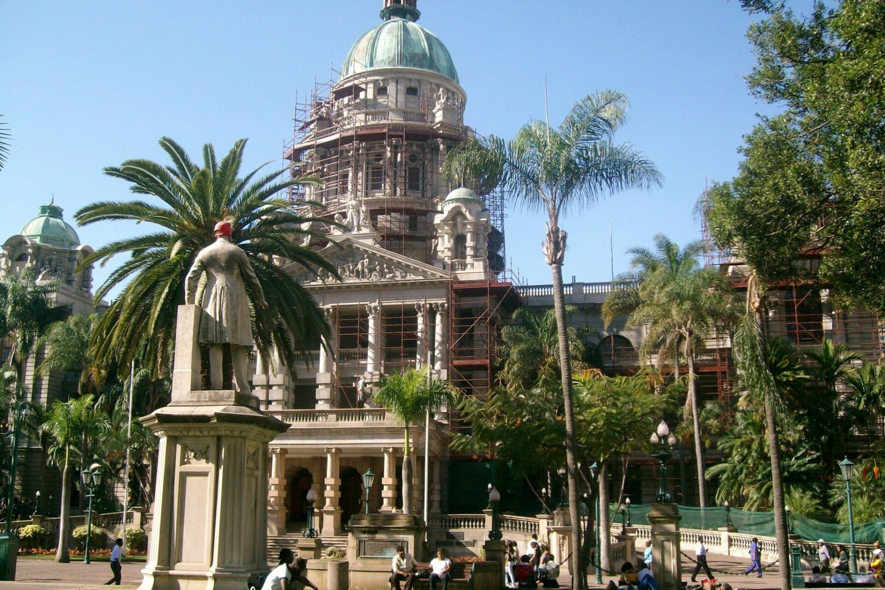 Durban City Hall with its green dome and palm trees in central Durban, South Africa