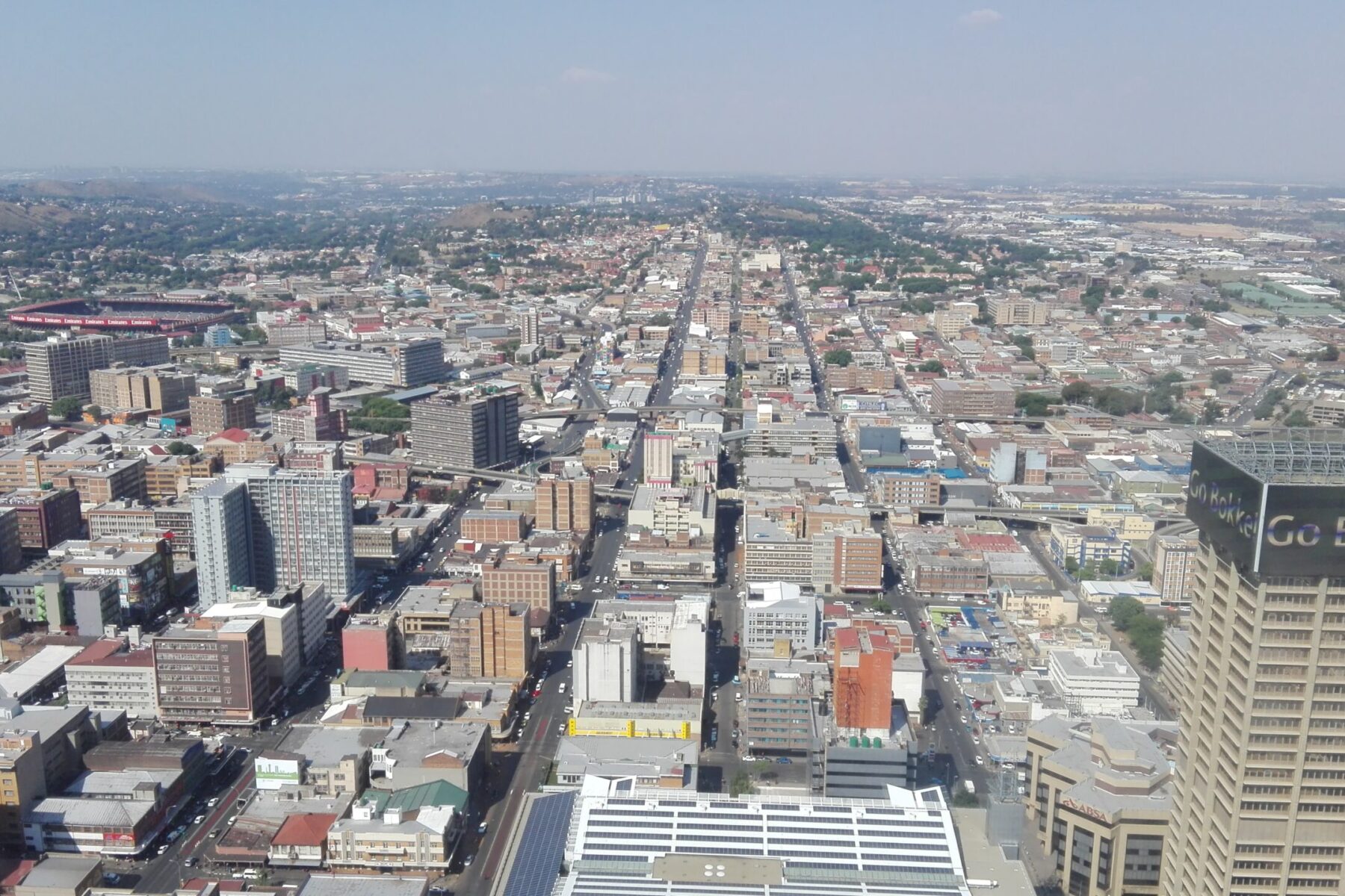 Aerial view of central Johannesburg with office towers and streets, seen from the Carlton Centre