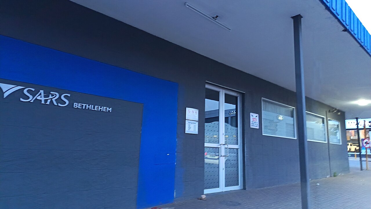 Entrance of a South African Revenue Service branch office with a blue SARS Bethlehem sign