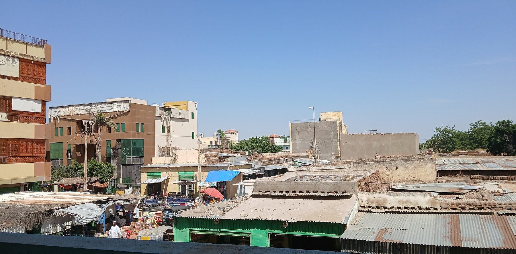 Stalls, shop roofs and buildings in the central market area of Nyala, South Darfur, Sudan, seen from above in a 2025 photo