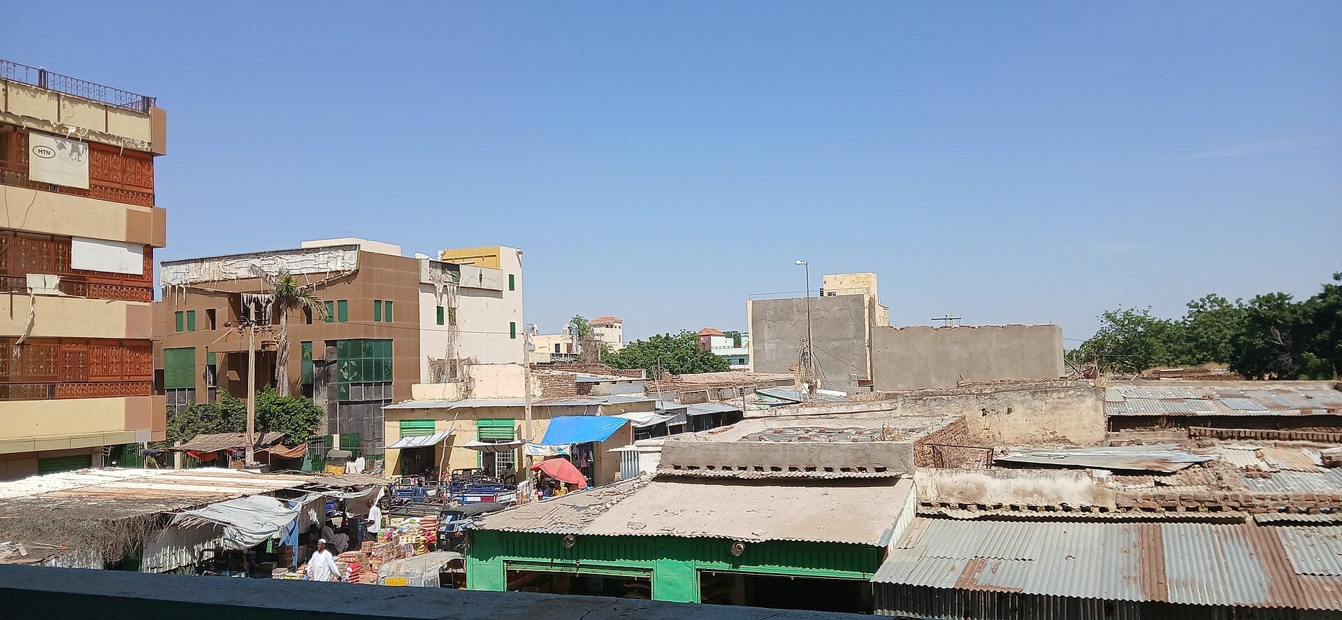 Stalls, shop roofs and buildings in the central market area of Nyala, South Darfur, Sudan, seen from above in a 2025 photo