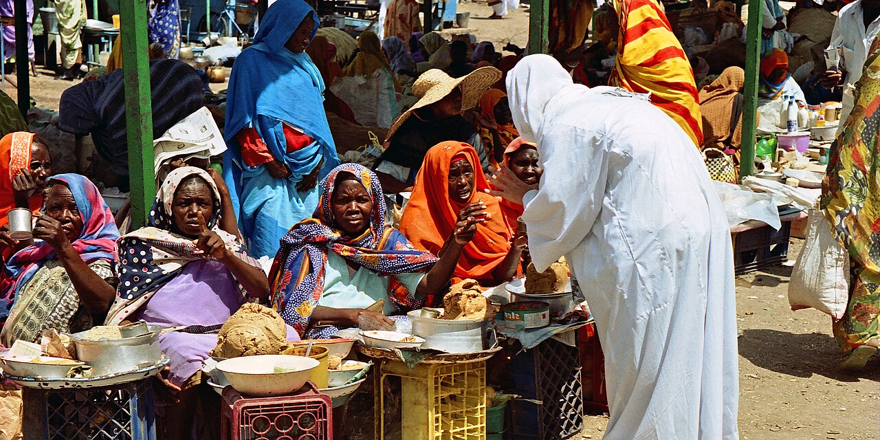 Women selling food at a market in Khartoum, Sudan