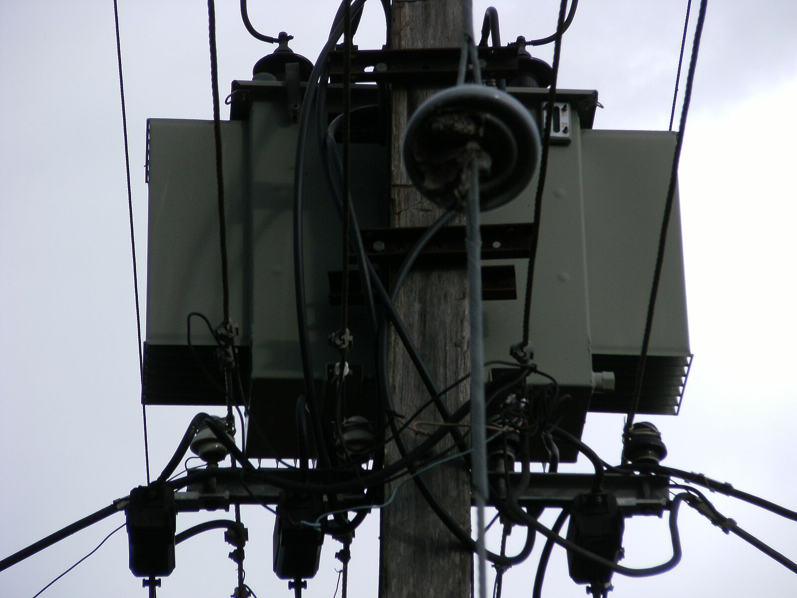 A pole-mounted electricity transformer in Paramaribo, Suriname