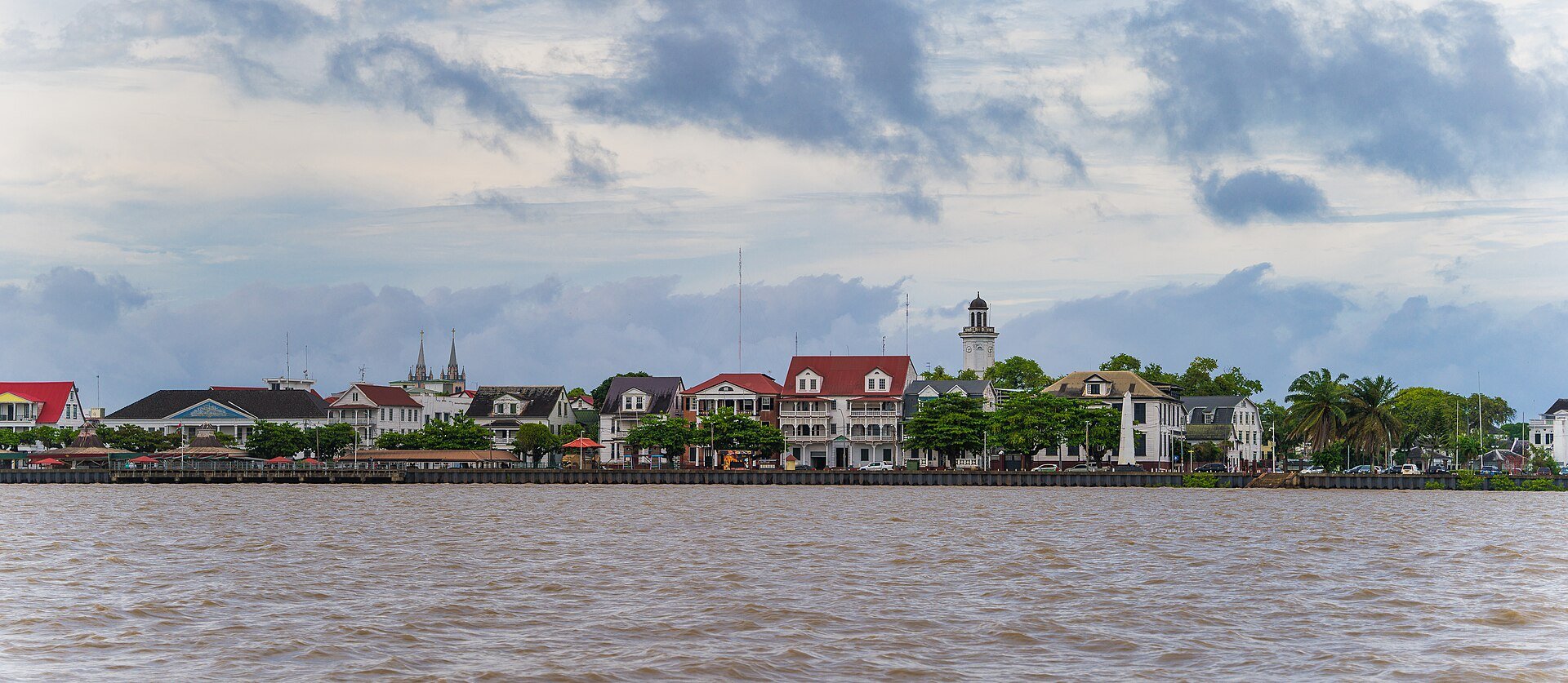 The Paramaribo waterfront seen from the Suriname River, with historic wooden buildings