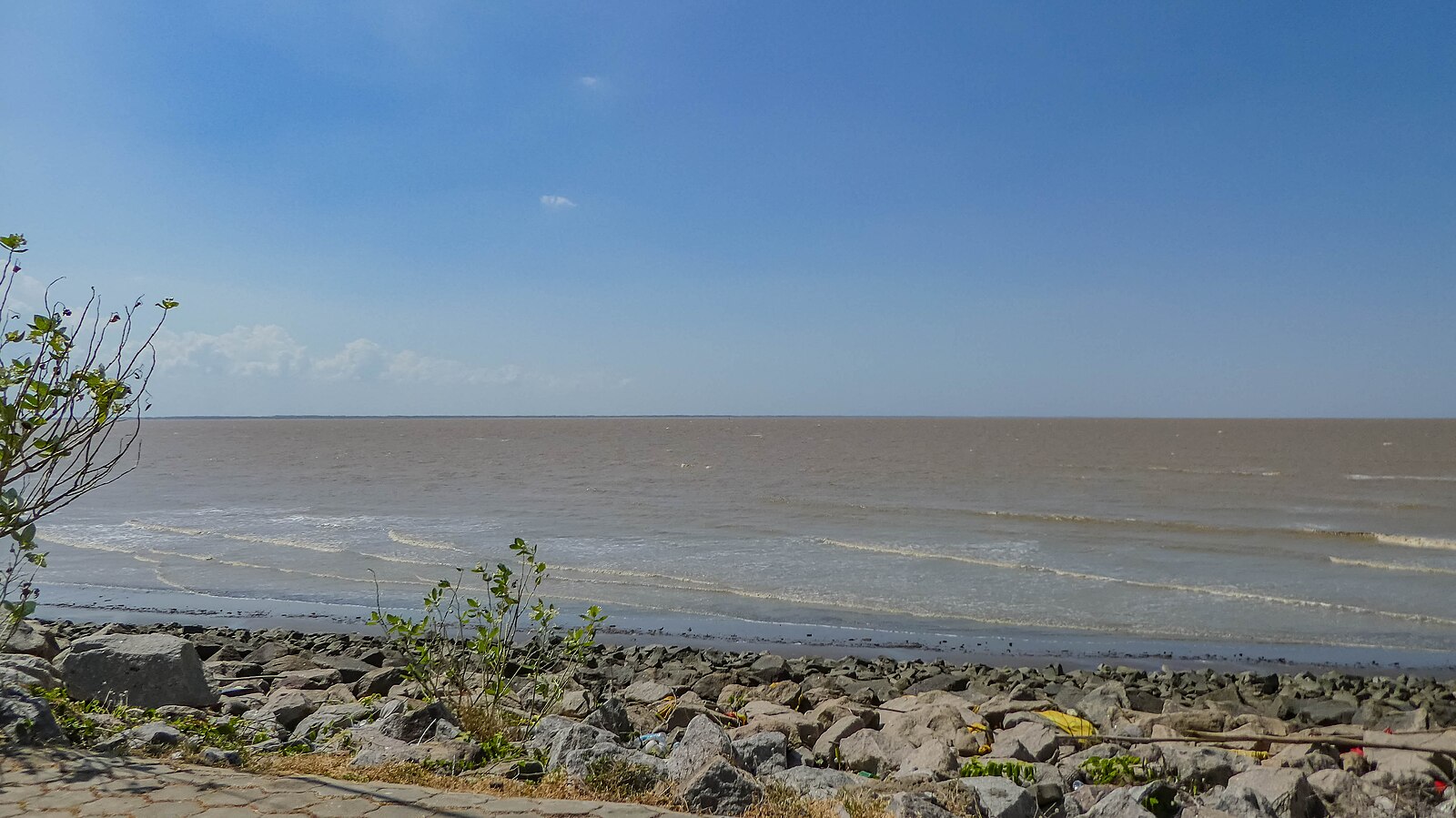 Suriname neighbourhood: the Corantijn shore near Nickerie, with Guyana in the distance
