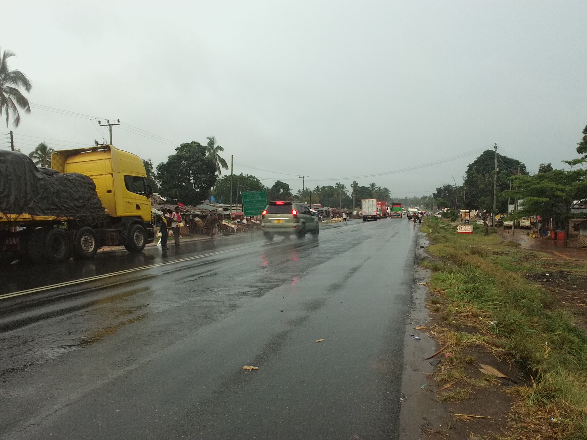 Lorries and cars on the wet highway at Mikese, east of Morogoro, Tanzania