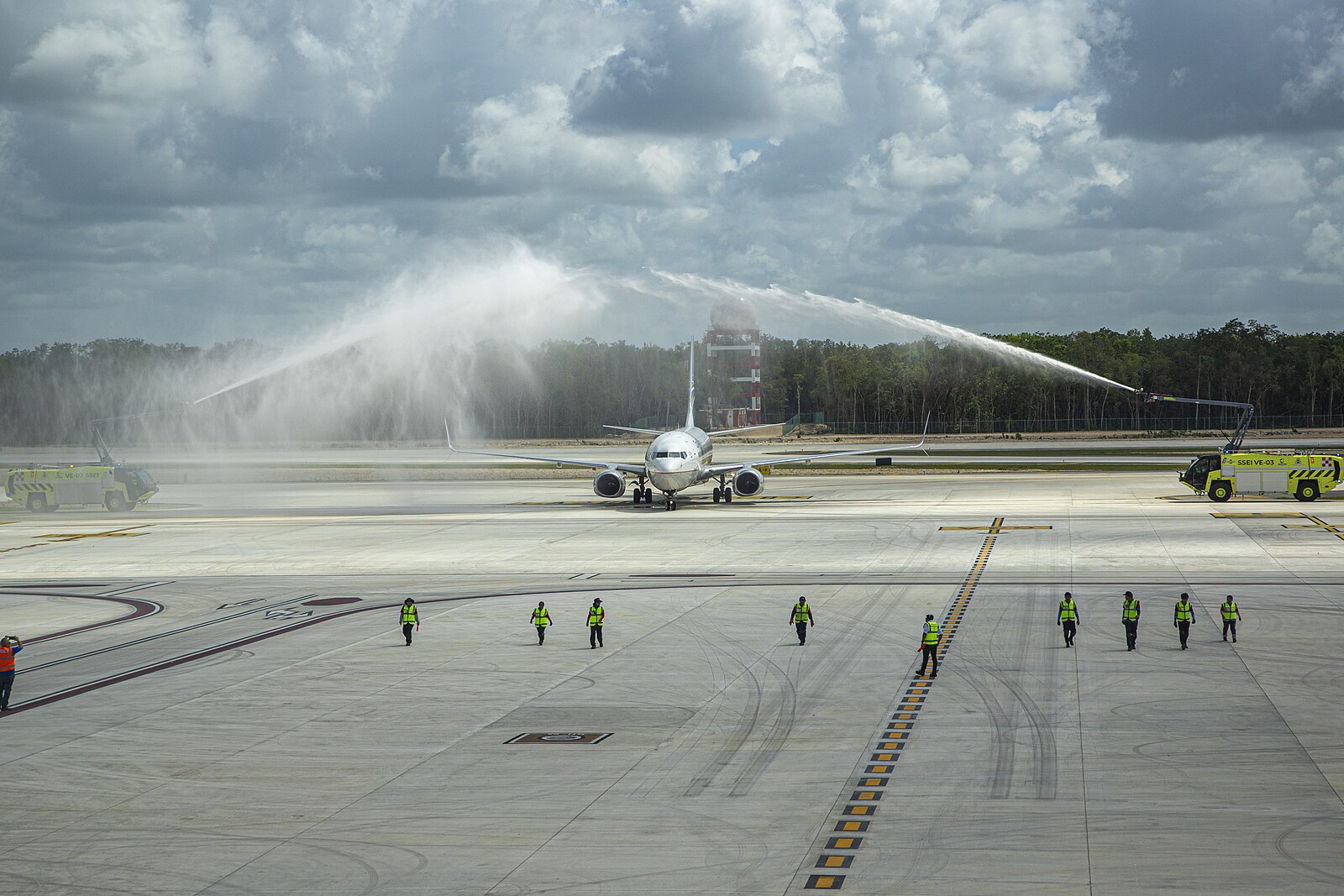 A jet given a water-cannon salute at Tulum International Airport, a gateway for tulum flights