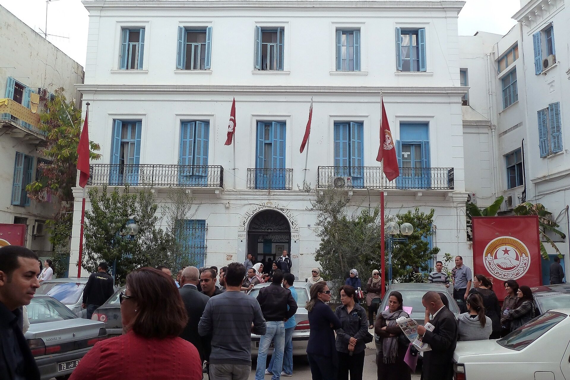 Crowd gathered outside the UGTT labour federation headquarters on Place Mohamed Ali in Tunis