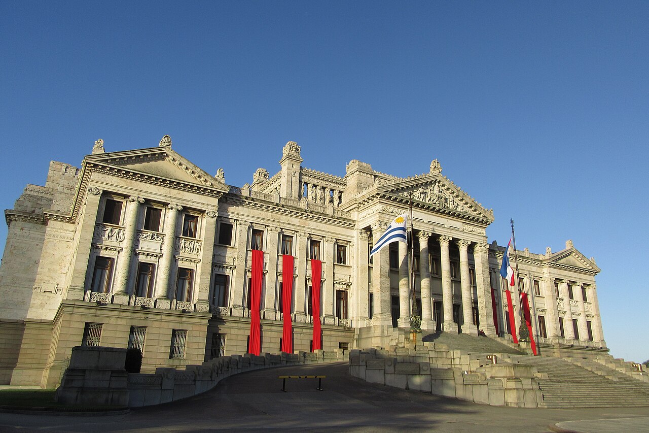 Uruguay's Legislative Palace in Montevideo with the national flag flying in front of its columns