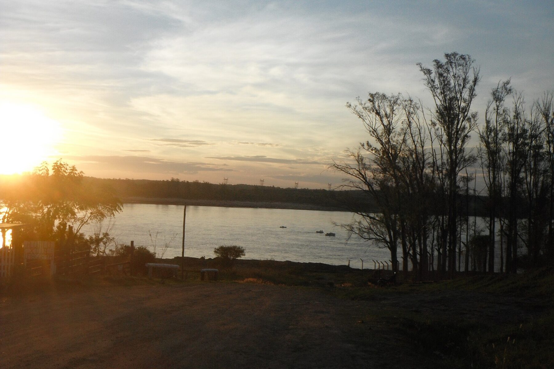 The Uruguay River seen from the riverbank in Salto, Uruguay, at sunset