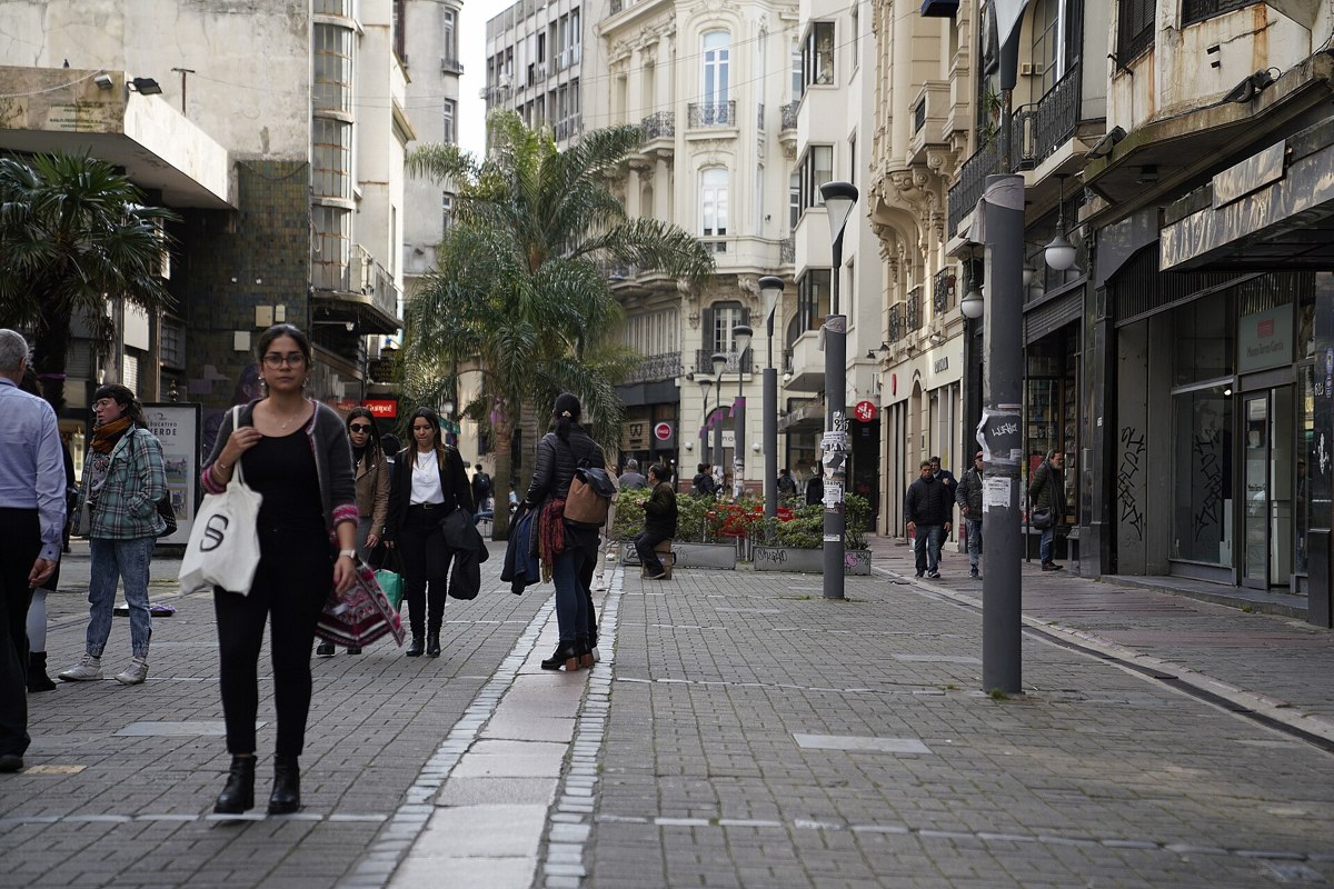 Pedestrians on Peatonal Sarandi in the old city of Montevideo, Uruguay