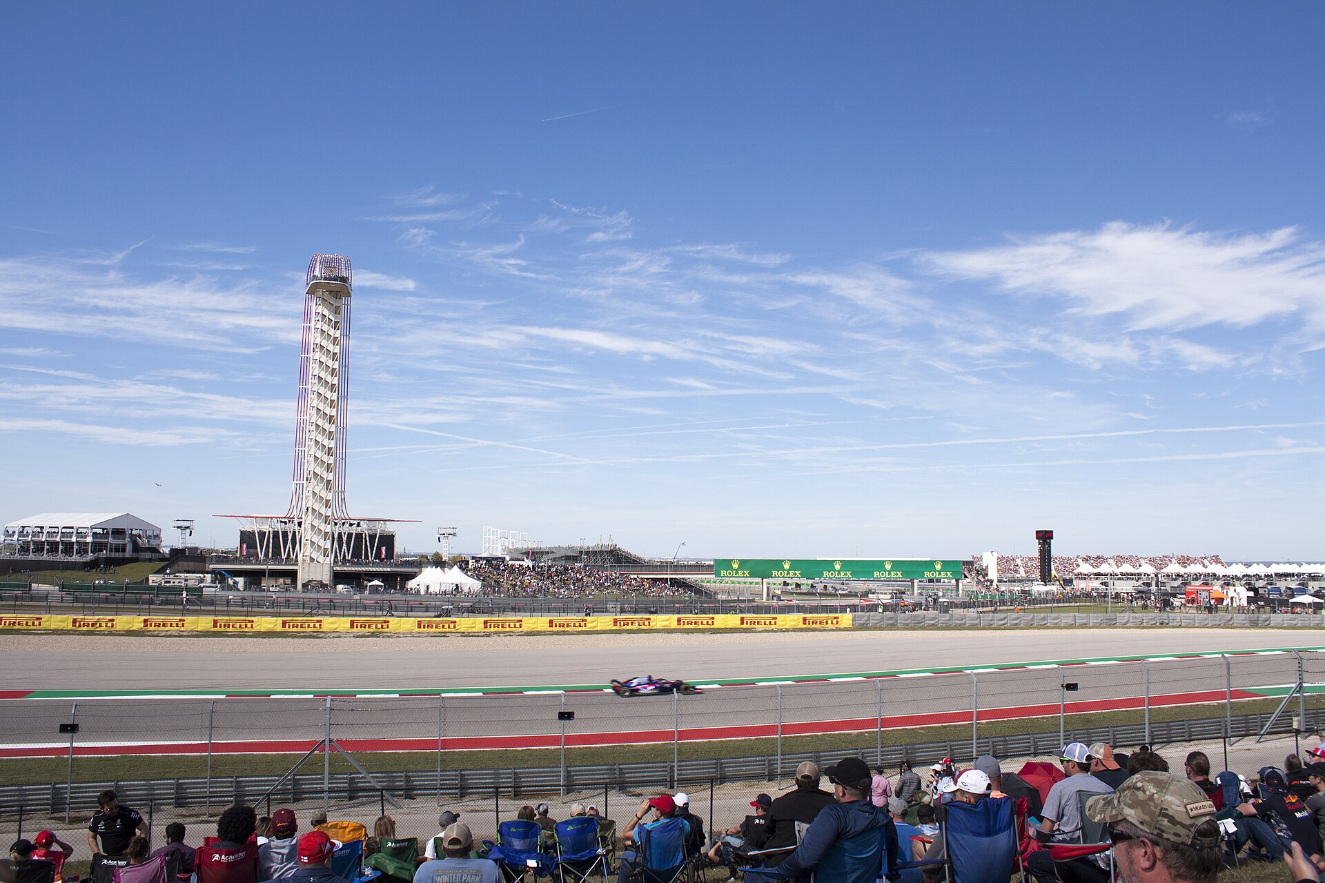 Formula 1 car on track in front of the tower at Circuit of The Americas