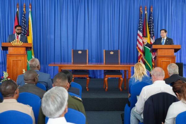 US Secretary of State Marco Rubio and Guyana's President Irfaan Ali speak at lecterns during a joint news conference in Georgetown, Guyana