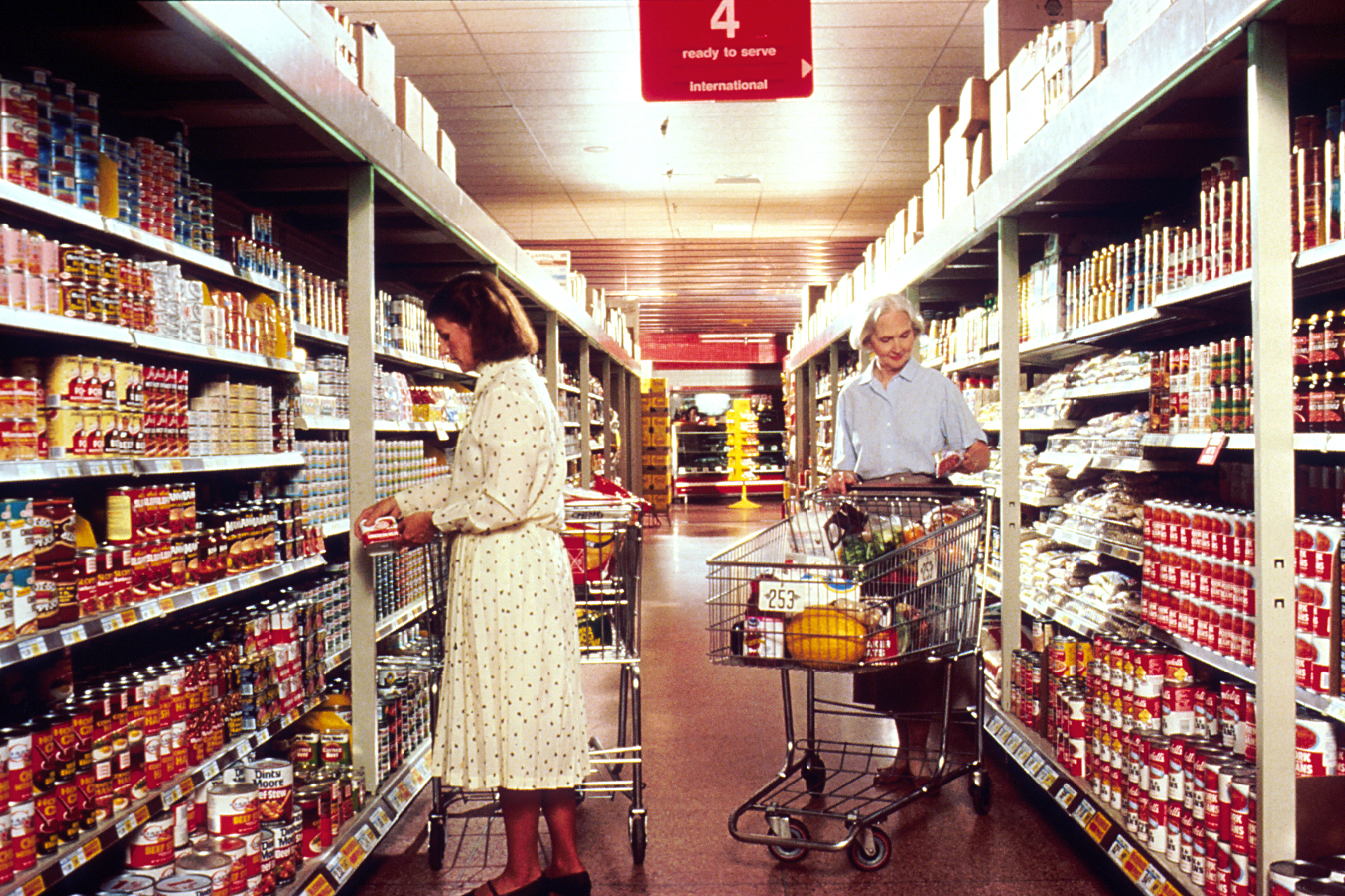 Shoppers in a US supermarket aisle