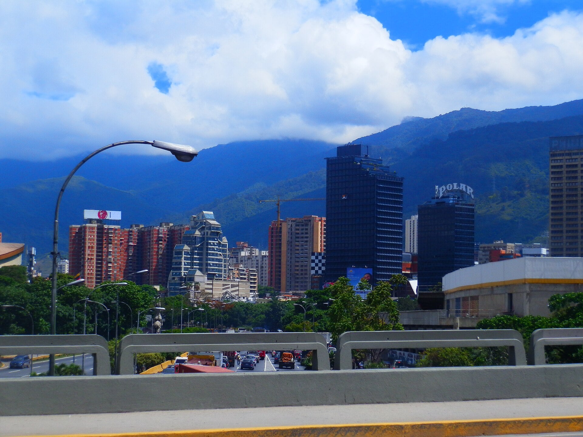 Caracas skyline with the Polar tower and the Ávila mountain range under cloud