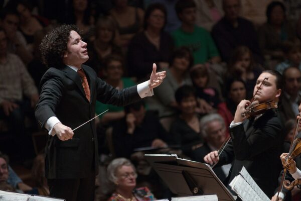 Venezuela culture: Gustavo Dudamel conducting the Simón Bolívar Youth Orchestra in London