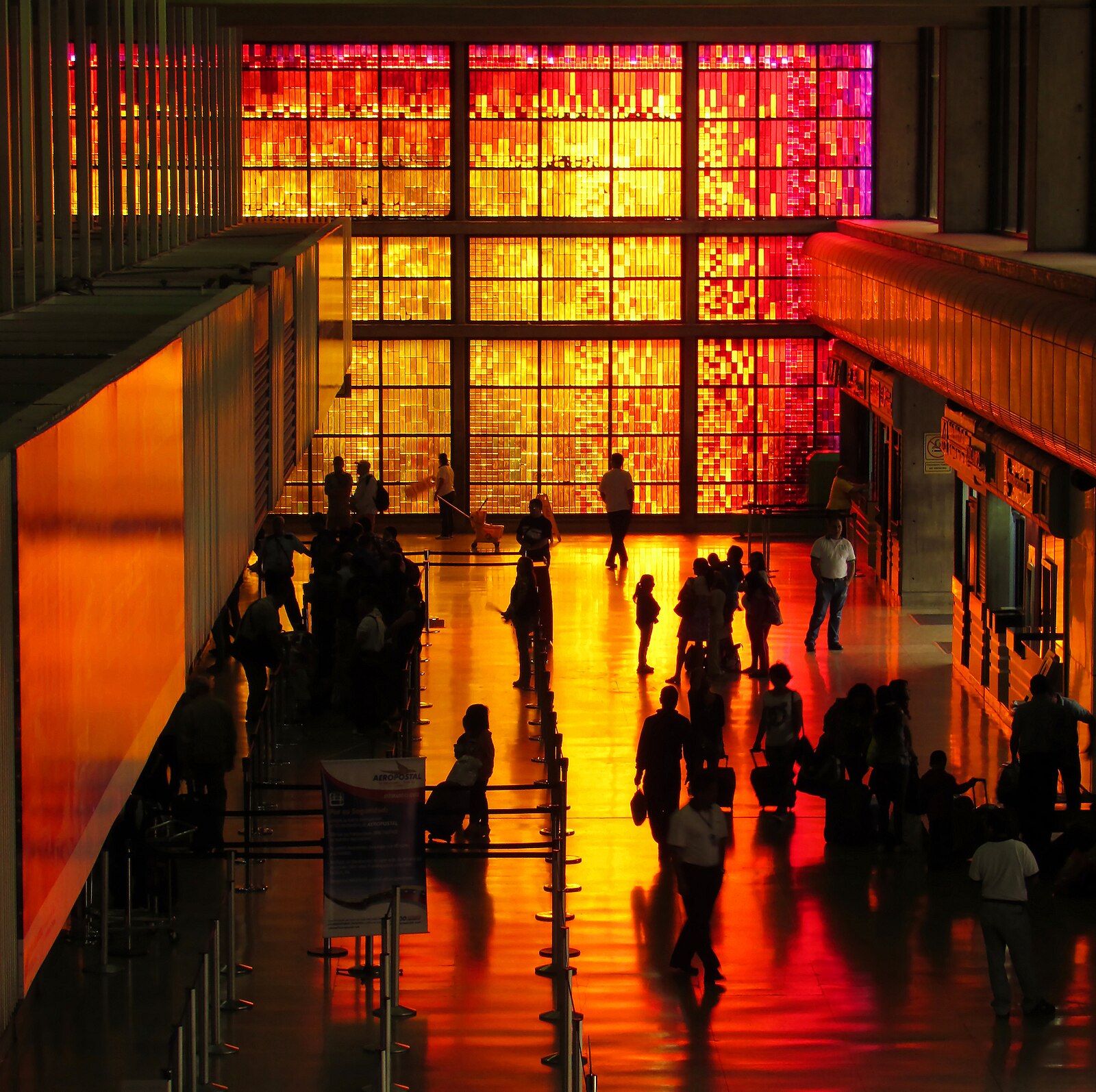 Venezuela culture: coloured glass wall in the national terminal at Maiquetía airport