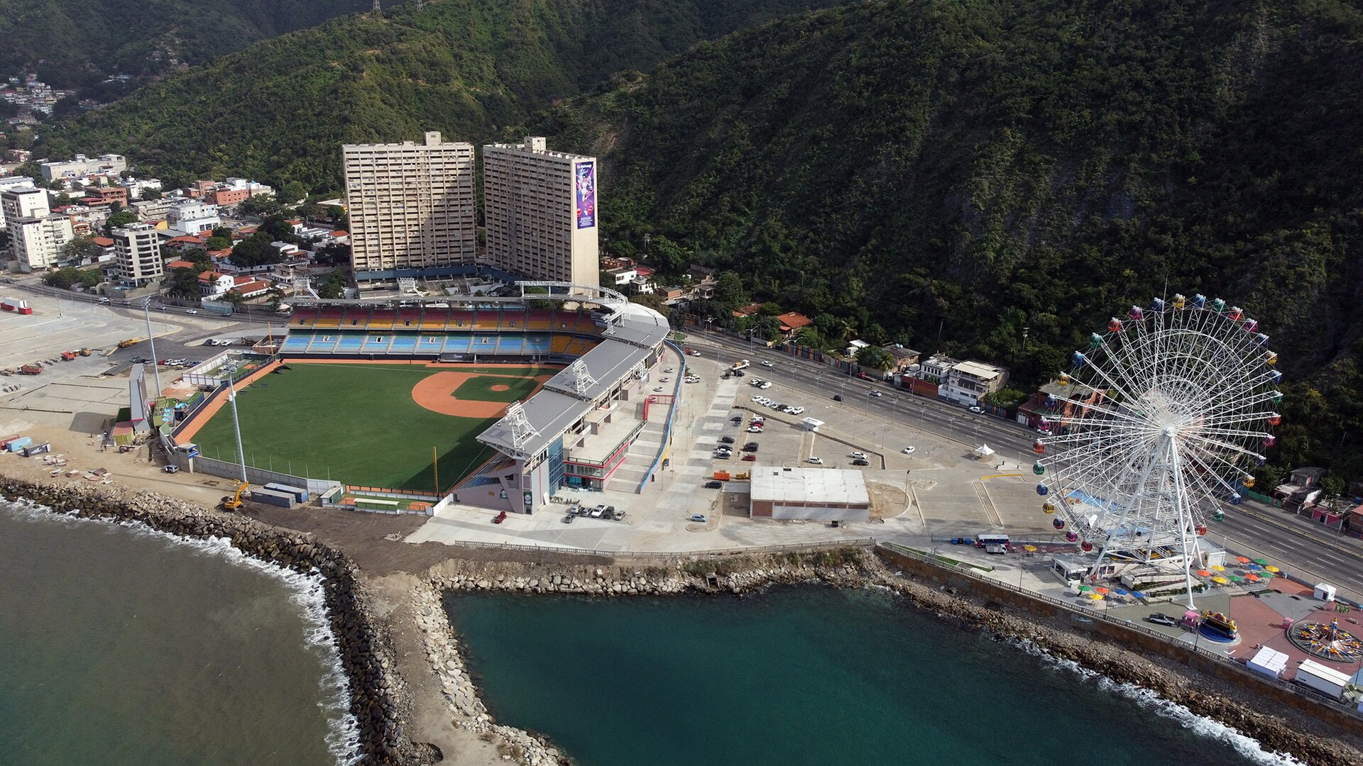 Aerial view of the Forum de La Guaira baseball stadium and the Ojo de La Guaira Ferris wheel at Macuto on the Venezuelan coast