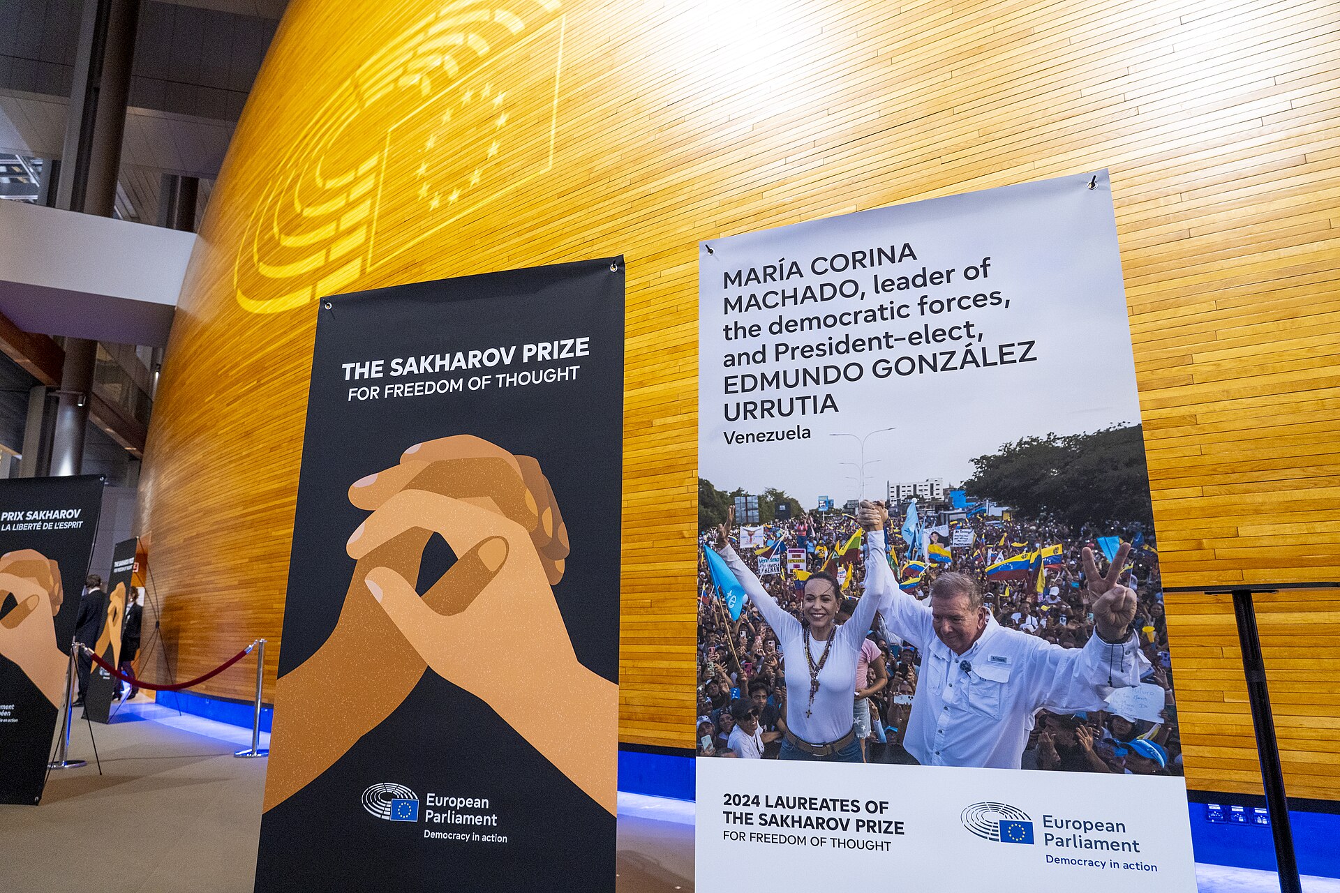 European Parliament banner showing María Corina Machado and Edmundo González at a rally in Venezuela