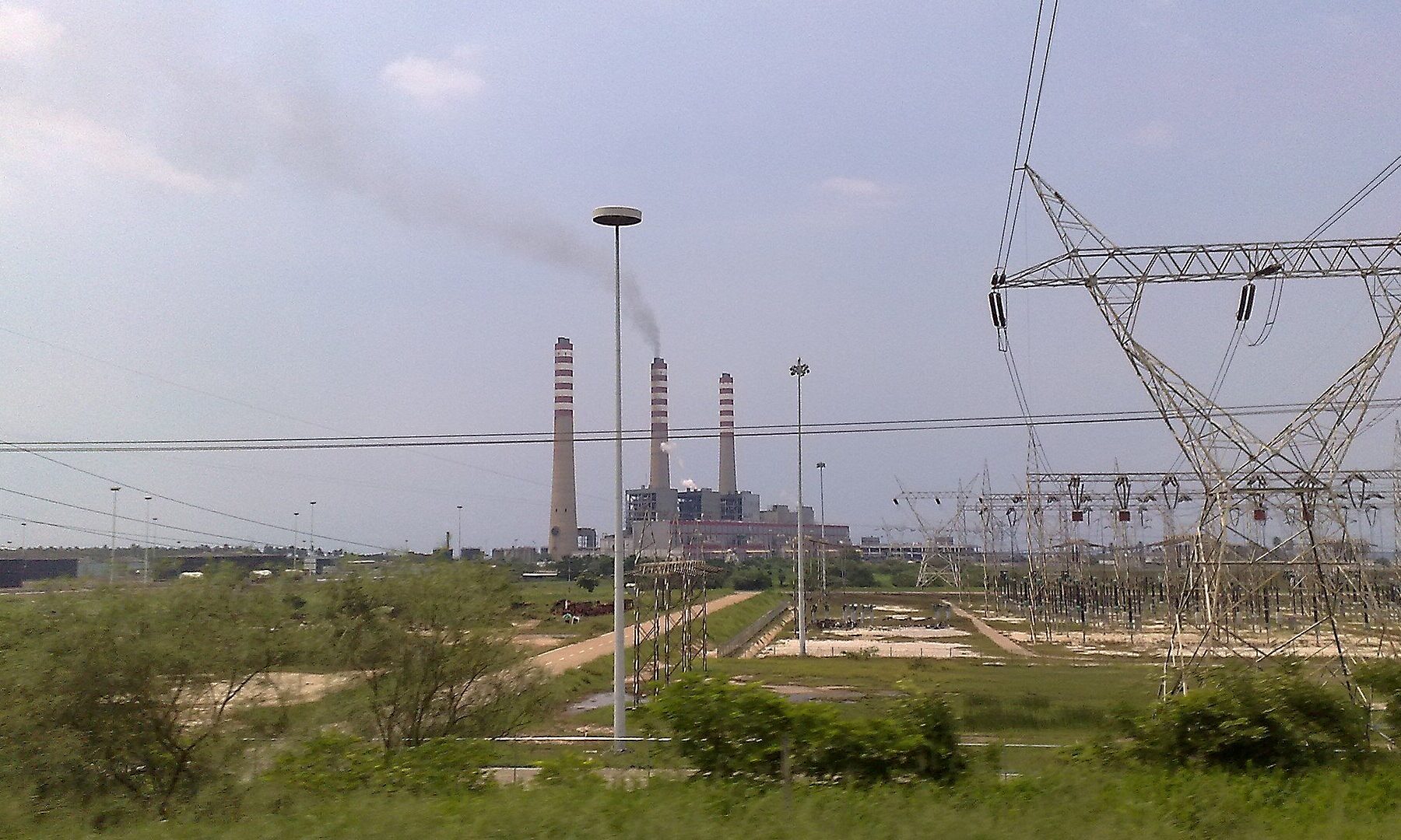 Venezuela power deficit: the chimneys and high-voltage pylons of the Planta Centro thermal power station in Carabobo state