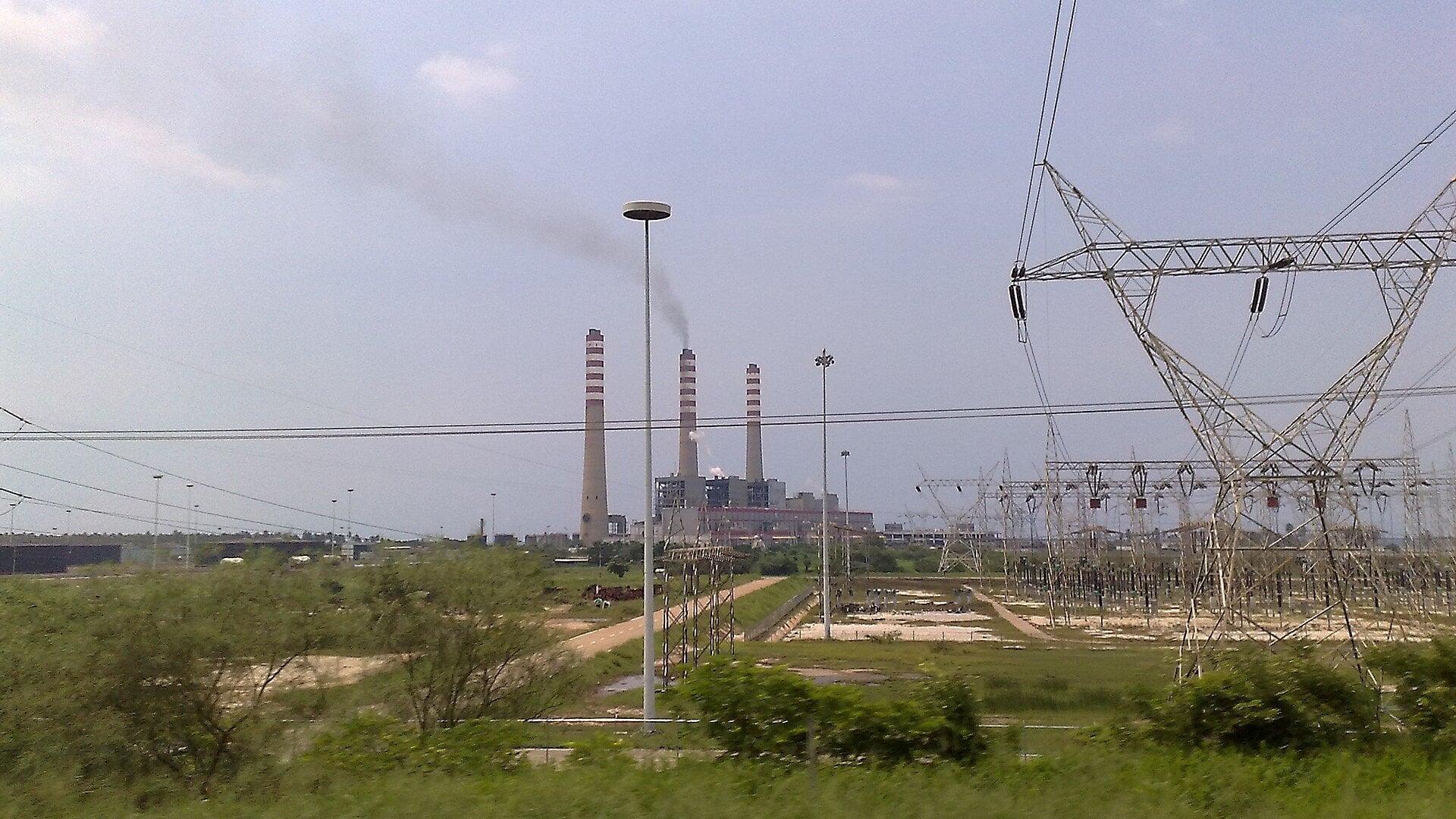 Venezuela power deficit: the chimneys and high-voltage pylons of the Planta Centro thermal power station in Carabobo state