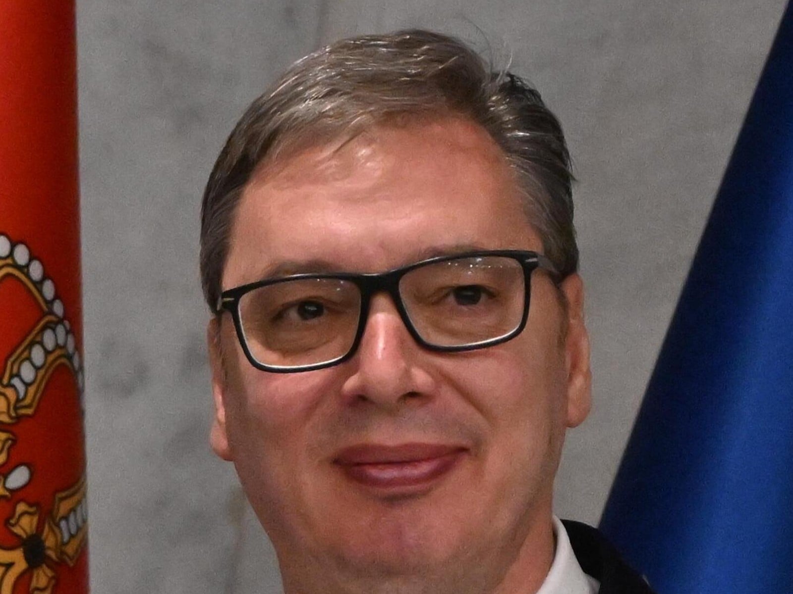 Serbian President Aleksandar Vučić in a dark suit