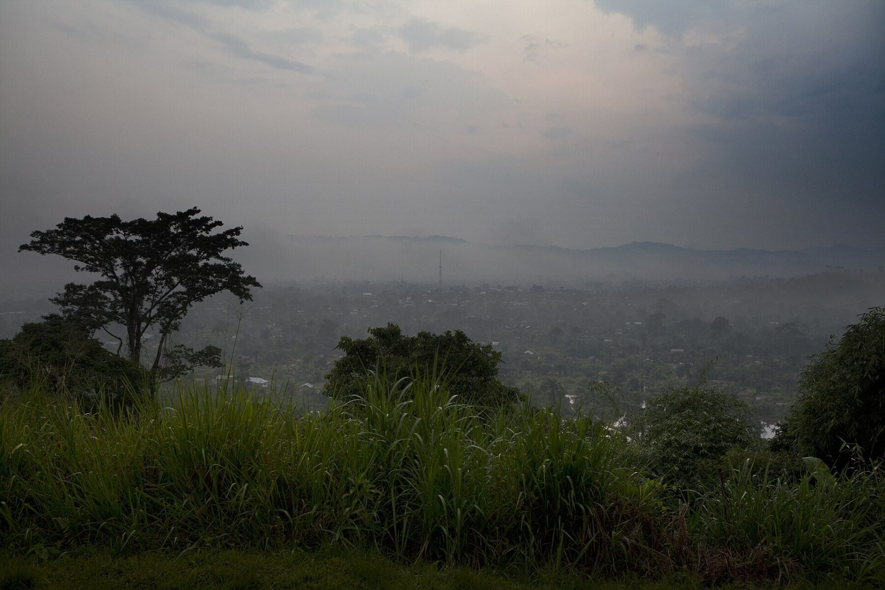 View over the town of Walikale in North Kivu, DR Congo, from a hillside under mist and low cloud