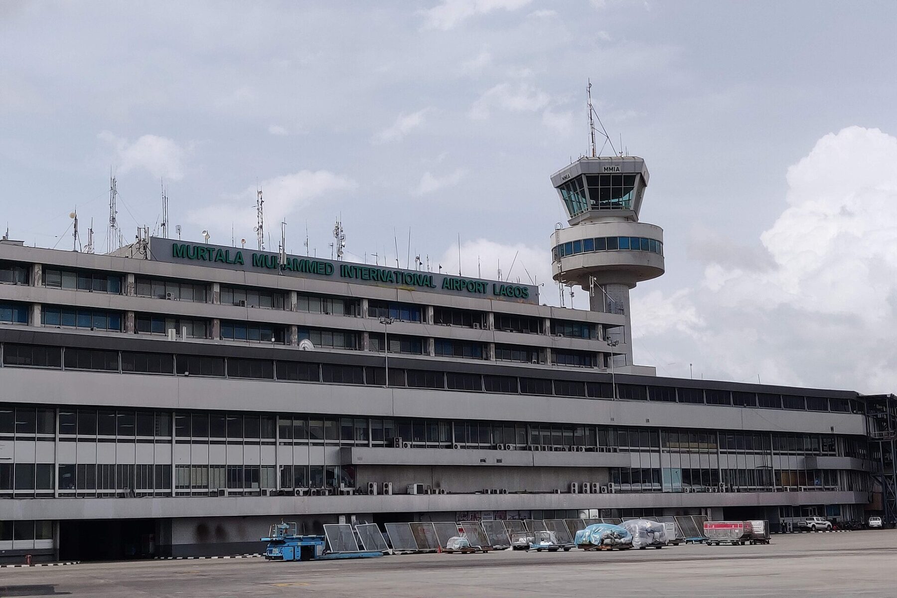 The Murtala Muhammed International Airport Lagos terminal building with its control tower and apron in the foreground