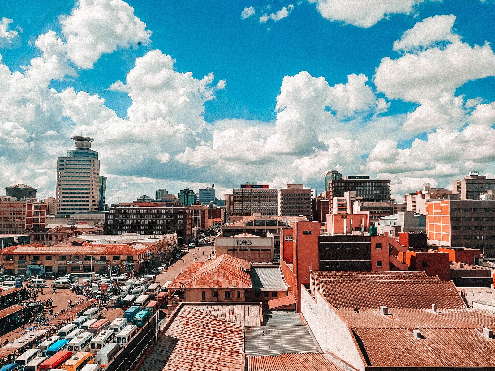 Zimbabwe geopolitics: central Harare with minibus rank and office towers
